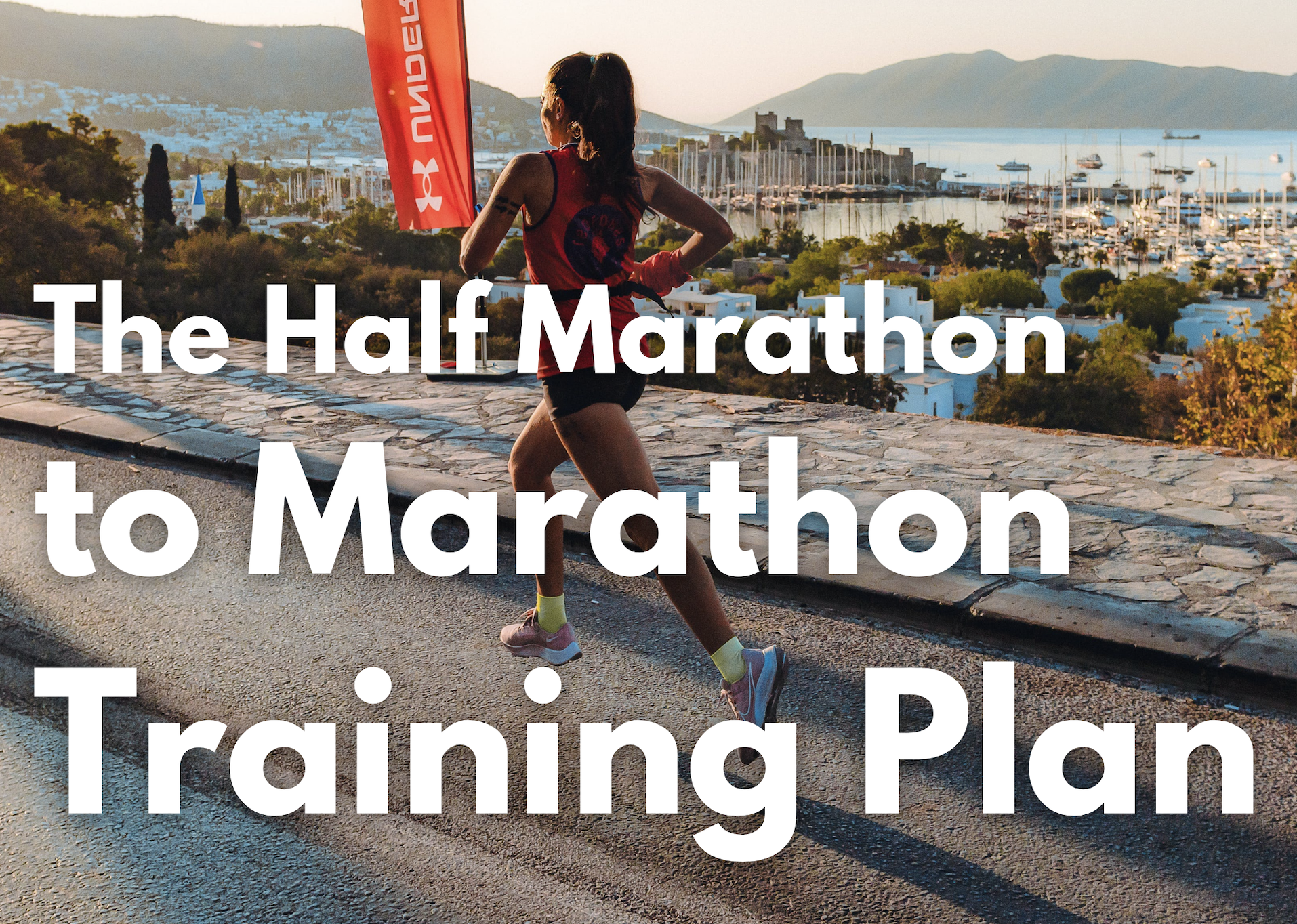 The half marathon to marathon training plan with a woman running on a tropical island location.